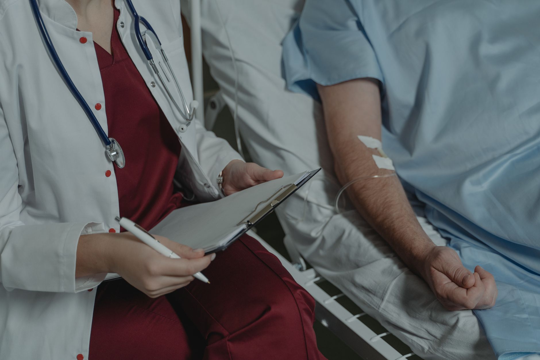 Doctor reviewing medical chart hospital
